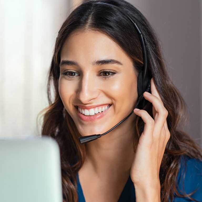 Call center operator with headphones